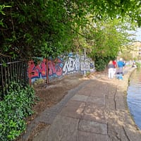 A photo of the towpath along the Regent's canal on a sunny spring day.