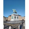 The statue of a man on a horse at Amalienborg castle in Copenhagen