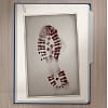 An image of an evidence folder containing a bloody shoe print