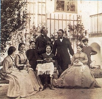 The Melcior family gathered in their garden