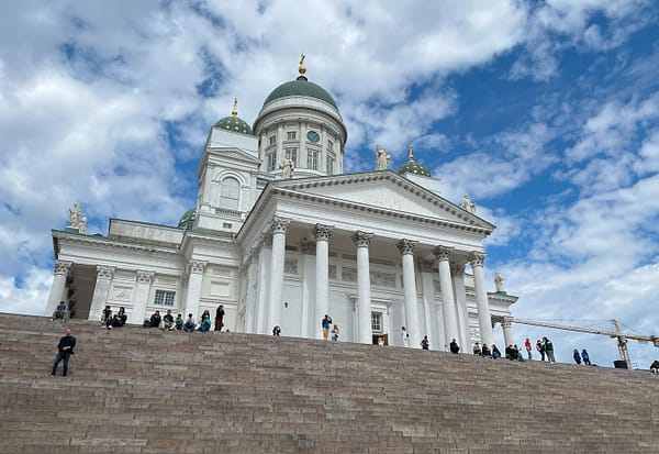 A photo of the Helsinki cathedral against a blue sky